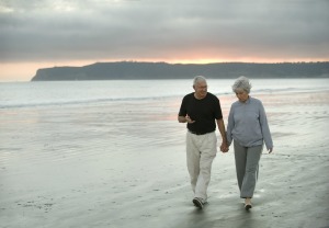 Walking Seniors on Beach