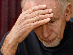 Elderly man sad and depressed
